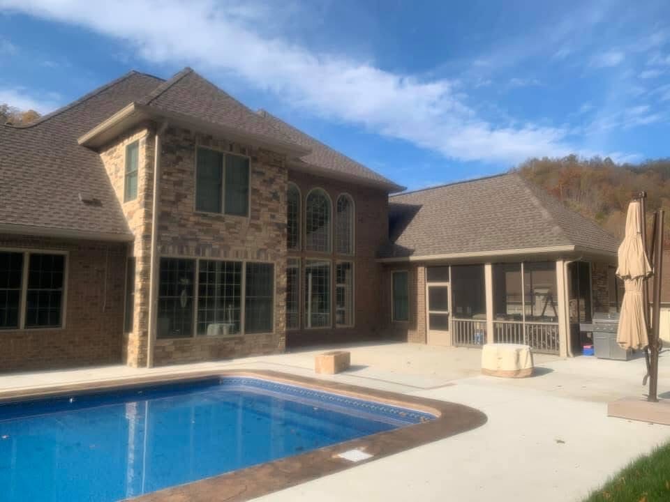 Custom home with in-ground pool and patio