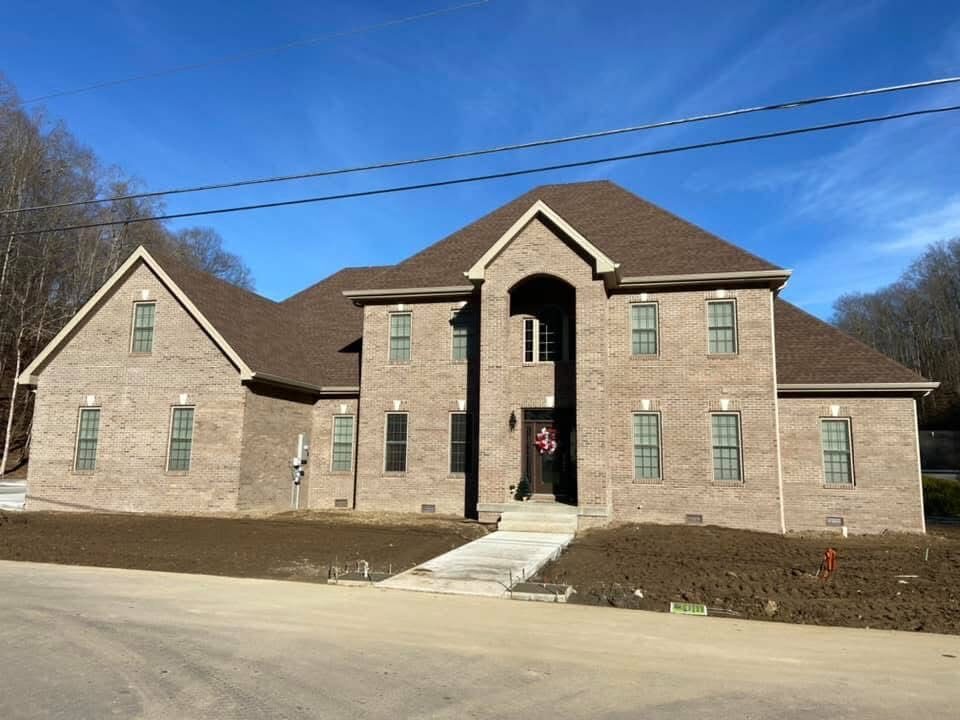 Brick two-story custom home under construction