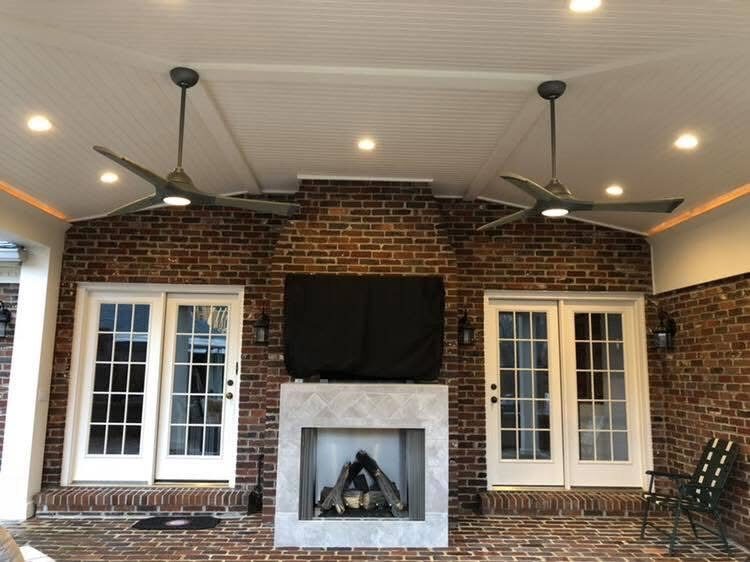Living room with fireplace and French doors