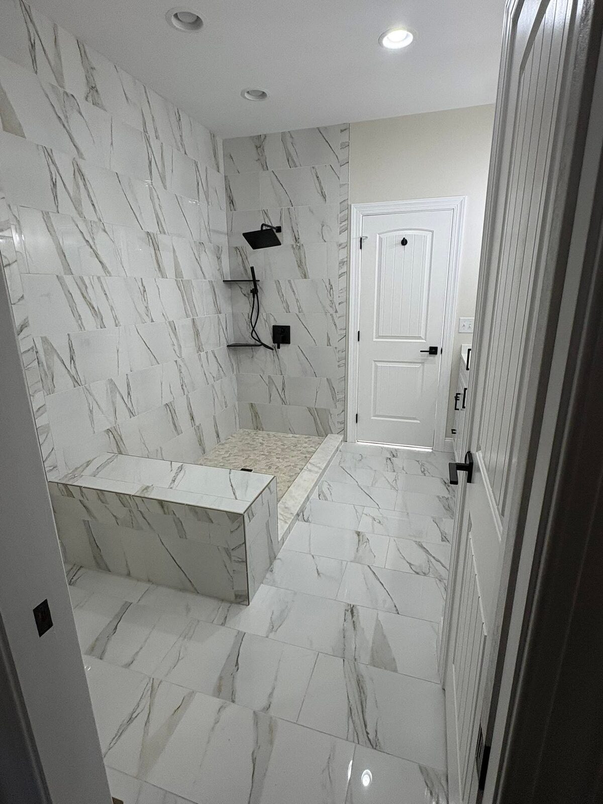 Bright entry with hardwood flooring and trim work